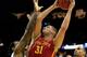 KANSAS CITY, MO - MARCH 14: Georges Niang #31 of the Iowa State Cyclones shoots over Tarik Black #25 of the Kansas Jayhawks during the Big 12 Basketball Tournament semifinal game at Sprint Center on March 14, 2014 in Kansas City, Missouri. (Photo by Jam