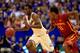 LAWRENCE, KS - JANUARY 29: Andrew Wiggins #22 of the Kansas Jayhawks controls the ball as Monte Morris #11 of the Iowa State Cyclones defends during the game at Allen Fieldhouse on January 29, 2014 in Lawrence, Kansas. (Photo by Jamie Squire/Getty Image