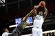 Mar 14, 2014; Atlanta, GA, USA; Kentucky Wildcats forward Julius Randle (30) grabs a rebound over LSU Tigers forward Jordan Mickey (25) during the first half in the quarterfinals of the SEC college basketball tournament at Georgia Dome. Mandatory Credit: