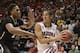 Mar 14, 2014; Las Vegas, NV, USA; Arizona Wildcats guard Nick Johnson (13) drives to the basket against Colorado Buffaloes forward Xavier Johnson (2) during the first half in the semifinals of the Pac-12 Conference college basketball tournament at MGM Gra