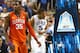 GREENSBORO, NC - MARCH 14: Landry Nnoko #35 of the Clemson Tigers watches as Rodney Hood #5 of the Duke Blue Devils reacts after a play during the quarterfinals of the 2014 Men's ACC Basketball Tournament at Greensboro Coliseum on March 14, 2014 in Green