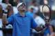 INDIAN WELLS, CA - MARCH 14: John Isner celebrates following his victory over Ernests Gulbis of Latvia during the BNP Paribas Open at Indian Wells Tennis Garden on March 14, 2014 in Indian Wells, California. (Photo by Jeff Gross/Getty Images)