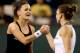 INDIAN WELLS, CA - MARCH 14: Agnieszka Radwanska of Poland is congratulated by Simona Halep of Romania after their match during the semifinals of the BNP Parabas Open at the Indian Wells Tennis Garden on March 14, 2014 in Indian Wells, California. (Phot