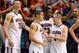 LAS VEGAS, NV - MARCH 14: Kaleb Tarczewski #35, Nick Johnson #13, Rondae Hollis-Jefferson #23 and T.J. McConnell #4 of the Arizona Wildcats celebrate on the bench as time expires in their semifinal game of the Pac-12 Basketball Tournament against the Col