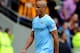 HULL, ENGLAND - MARCH 15: Vincent Kompany of Manchester City leaves the field after being shown a red card during the Barclays Premier League match between Hull City and Manchester City at the KC Stadium on March 15, 2014 in Hull, England. (Photo by Clin