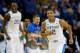 ATLANTA, GA - MARCH 14: Aaron Harrison #2 of the Kentucky Wildcats reacts after hitting a three-point basket against the LSU Tigers during the quarterfinals of the SEC Men's Basketball Tournament at Georgia Dome on March 14, 2014 in Atlanta, Georgia. (P
