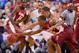 Mar 14, 2014; Greensboro, NC, USA; Florida State Seminoles guard Aaron Thomas (25) fights for the ball with Virginia Cavaliers guard Malcolm Brogdon (15) in the first half in the quarterfinals of the ACC college basketball tournament at Greensboro Colise