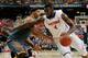 ATLANTA, GA - MARCH 15: Patric Young #4 of the Florida Gators drives with the ball against Jarnell Stokes #5 of the Tennessee Volunteers during the semifinals of the SEC Men's Basketball Tournament at Georgia Dome on March 15, 2014 in Atlanta, Georgia.
