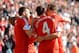 SOUTHAMPTON, ENGLAND - MARCH 15: First goal scorer Morgan Schneiderlin of Southampton is kissed by Gaston Ramírez of Southampton during the Barclays Premier League match between Southampton and Norwich City at St Mary's Stadium on March 15, 2014 in South