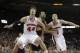 MADISON, WI - MARCH 05: Frank Kaminsky #44 of the Wisconsin Badgers and Ben Brust #1 box out A.J. Hammons #20 of the Purdue Boilermakers during a free throw in the second half at Kohl Center on March 05, 2014 in Madison, Wisconsin. (Photo by Mike McGinnis
