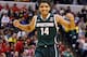 Mar 15, 2014; Indianapolis, IN, USA; Michigan State Spartans guard Gary Harris (14) reacts to a score by the Spartans in a game against the Wisconsin Badgers in the semifinals of the Big Ten college basketball tournament at Bankers Life Fieldhouse. Mandat