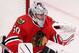 CHICAGO, IL - MARCH 14: Corey Crawford #50 of the Chicago Blackhawks makes a glove save against the Nashville Predators at the United Center on March 14, 2014 in Chicago, Illinois. The Predators defeated the Blackhawks 3-2. (Photo by Jonathan Daniel/Gett