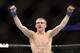 BRISBANE, AUSTRALIA - DECEMBER 07: Justin Scoggins of the USA celebrates his TKO victory over Richie Vaculik in their flyweight fight during the UFC Fight Night event at the Brisbane Entertainment Centre on December 7, 2013 in Brisbane, Australia. (Phot