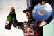 Ricciardo celebrates on the podium.