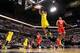 INDIANAPOLIS, IN - MARCH 15: Jordan Morgan #52 of the Michigan Wolverines dunks the ball during the first half of the Big Ten Basketball Tournament Semifinal game against the Ohio State Buckeyes at Bankers Life Fieldhouse on March 15, 2014 in Indianapoli