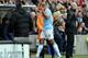 HULL, ENGLAND - MARCH 15: Vincent Kompany of Manchester City gestures with his hand as he leaves the field after being shown a red card during the Barclays Premier League match between Hull City and Manchester City at the KC Stadium on March 15, 2014 in