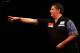 LONDON, ENGLAND - DECEMBER 28: Gary Anderson of Scotland in action during his third round match against Michael van Gerwen of Holland on day thirteen of the Ladbrokes.com World Darts Championship at Alexandra Palace on December 28, 2013 in London, England