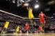 INDIANAPOLIS, IN - MARCH 15: Jordan Morgan #52 of the Michigan Wolverines dunks the ball during the first half of the Big Ten Basketball Tournament Semifinal game against the Ohio State Buckeyes at Bankers Life Fieldhouse on March 15, 2014 in Indianapoli