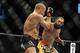 Nov 16, 2013; Las Vegas, NV, USA; Georges St-Pierre (red gloves) fights against Johny Hendricks (blue gloves) in their welterweight championship bout during UFC 167 at MGM Grand Garden Arena. Mandatory Credit: Stephen R. Sylvanie-USA TODAY Sports