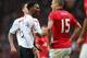 MANCHESTER, ENGLAND - MARCH 16: Nemanja Vidic of Manchester United has words with Daniel Sturridge of Liverpool after the award of the second penalty kick during the Barclays Premier League match between Manchester United and Liverpool at Old Trafford on