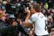 MANCHESTER, ENGLAND - MARCH 16: Steven Gerrard of Liverpool celebrates scoring the second goal by kissing the steadicam during the Barclays Premier League match between Manchester United and Liverpool at Old Trafford on March 16, 2014 in Manchester, Engl