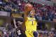INDIANAPOLIS, IN - MARCH 14: Glenn Robinson III #1 of the Michigan Wolverines shoots the ball in the game against the Illinois Fighting Illini during the Quarterfinals of the Big Ten Basketball Tournament at Bankers Life Fieldhouse on March 14, 2014 in I