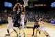 LAS VEGAS, NV - MARCH 13: Dustin Thomas #13 of the Colorado Buffaloes shoots between Jabari Bird #23 and Richard Solomon #35 of the California Golden Bears during a quarterfinal game of the Pac-12 Basketball Tournament at the MGM Grand Garden Arena on Ma
