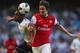 LONDON, ENGLAND - MARCH 16: Danny Rose of Tottenham Hotspur and Tomas Rosicky of Arsenal battle for the ball during the Barclays Premier League match between Tottenham Hotspur and Arsenal at White Hart Lane on March 16, 2014 in London, England. (Photo b