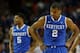 ATLANTA, GA - MARCH 16: Aaron Harrison #2 and Andrew Harrison #5 of the Kentucky Wildcats react in the first half against the Florida Gators during the Championship game of the 2014 Men's SEC Basketball Tournament at Georgia Dome on March 16, 2014 in Atl