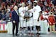 Mar 15, 2014; Memphis, TN, USA; America Athletic Conference commissioner Mike Aresco presents the trophy to Louisville Cardinals forward Luke Hancock guard Russ Smith and forward Montrezl Harrell after the game against the Connecticut Huskies in final of