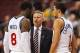 Mar 12, 2014; Philadelphia, PA, USA; Philadelphia 76ers head coach Brett Brown talks with guard Tony Wroten (8) and guard Michael Carter-Williams (1) during the second quarter against the Sacramento Kings at the Wells Fargo Center. The Kings defeated the