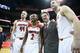 LOUISVILLE, KY - MARCH 08: Stephan Van Treese #44 , Tim Henderson #15, Russ Smith #2, Rick Pitino and Luke Hancock #11 of the Louisville Cardinals after the game against the Connecticut Huskies at KFC YUM! Center on March 8, 2014 in Louisville, Kentucky.