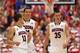TUCSON, AZ - FEBRUARY 26: (L-R) Nick Johnson #13, Aaron Gordon #11 and Kaleb Tarczewski #35 of the Arizona Wildcats react after scoring against the California Golden Bears during the second half of the college basketball game at McKale Center on February