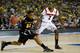 ATLANTA, GA - APRIL 06: Tekele Cotton #32 of the Wichita State Shockers attempts to bring the ball up court in the second half against Russ Smith #2 of the Louisville Cardinals during the 2013 NCAA Men's Final Four Semifinal at the Georgia Dome on April