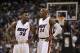 Mar 16, 2014; Miami, FL, USA; Miami Heat guard Norris Cole (left) chats with teammate guard Ray Allen (right) during the second half against the Houston Rockets at American Airlines Arena. Mandatory Credit: Steve Mitchell-USA TODAY Sports