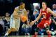 UNIVERSITY PARK, PA - MARCH 02: D.J. Newbill #2 of the Penn State Nittany Lions drives to the basket around the defense of Josh Gasser #21 of the Wisconsin Badgers during the second half at the Bryce Jordan Center on March 2, 2014 in University Park, Pen