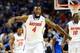 Mar 16, 2014; Atlanta, GA, USA; Florida Gators center Patric Young (4) reacts as time expires and his team defeats the Kentucky Wildcats in the championship game for the SEC college basketball tournament at Georgia Dome. Florida defeated Kentucky 61-60. M