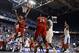 Dec 28, 2013; Lexington, KY, USA; Louisville Cardinals forward Luke Hancock (11) shoots against the Kentucky Wildcats during the second half at Rupp Arena. Kentucky defeated Louisville 73-66. Mandatory Credit: Jamie Rhodes-USA TODAY Sports