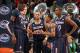 MEMPHIS, TN - MARCH 15: Amida Brimah #35, Niels Giffey #5, Shabazz Napier #13, Ryan Boatright #11 and Lasan Kromah #20 of the Connecticut Huskies huddle together against the Louisville Cardinals during the Championship of the American Athletic Conference