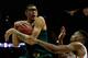 KANSAS CITY, MO - MARCH 15: Isaiah Austin #21 of the Baylor Bears pulls down a rebound over Melvin Ejim #3 of the Iowa State Cyclones during the 2014 Big 12 Men's Championship at the Sprint Center on March 15, 2014 in Kansas City, Missouri. (Photo by Jam
