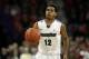 Nov 16, 2013; Green Bay, WI, USA; Wisconsin-Green Bay Phoenix guard Carrington Love (12) takes the ball down the floor as his team plays the Wisconsin Badgers at the Resch Center in Ashwaubenon. Wisconsin defeated Wisconsin-Green Bay 69-66. Mandatory Cred