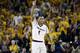 TEMPE, AZ - FEBRUARY 14: Jahii Carson #1 of the Arizona State Sun Devils reacts after taking the lead late in the second overtime against the Arizona Wildcats during a college basketball game at Wells Fargo Arena on February 14, 2014 in Tempe, Arizona.