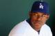 GLENDALE, AZ - MARCH 10: Yasiel Puig #66 of the Los Angeles Dodgers watches from the dugout during the spring training game against the Oakland Athletics at Camelback Ranch on March 10, 2014 in Glendale, Arizona. (Photo by Christian Petersen/Getty Image