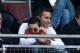 LONDON, ENGLAND - MARCH 25: Robin Van Persie of Arsenal sits with his son Shaqueel and team mate Thomas Vermaelen watch the game during the NextGen Series Final between Ajax U19 and Inter Milan U19 at Matchroom Stadium on March 25, 2012 in London, Englan