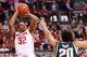 COLUMBUS, OH - MARCH 9: Lenzelle Smith, Jr. #32 of the Ohio State Buckeyes shoots over the defense of Travis Trice #20 of the Michigan State Spartans in the second half on March 9, 2014 at Value City Arena in Columbus, Ohio. Ohio State defeated Michigan