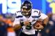 EAST RUTHERFORD, NJ - FEBRUARY 02: Quarterback Russell Wilson #3 of the Seattle Seahawks runs the ball against the Denver Broncos during Super Bowl XLVIII at MetLife Stadium on February 2, 2014 in East Rutherford, New Jersey. (Photo by Elsa/Getty Images