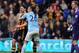 HULL, ENGLAND - MARCH 15: George Boyd (L) of Hull City is held back by Martin Demichelis (C) of Manchester City after a clash with Joe Hart (R) during the Barclays Premier League match between Hull City and Manchester City at the KC Stadium on March 15,