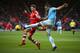 SOUTHAMPTON, ENGLAND - DECEMBER 07: Adam Lallana of Southampton and Martin Demichelis of Manchester City in action during the Barclays Premier League match between Southampton and Manchester City at St Mary's Stadium on December 7, 2013 in Southampton, E