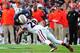 AUBURN, AL - NOVEMBER 16: Sammie Coates #18 of the Auburn Tigers is tackled by Tray Matthews #28 of the Georgia Bulldogs at Jordan-Hare Stadium on November 16, 2013 in Auburn Alabama. (Photo by Scott Cunningham/Getty Images)