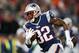 Jan 20, 2013; Foxboro, Massachusetts, USA; New England Patriots cornerback Devin McCourty (32) carries the ball during the fourth quarter against the Baltimore Ravens at Gillette Stadium. Mandatory Credit: Greg M. Cooper-USA TODAY Sports